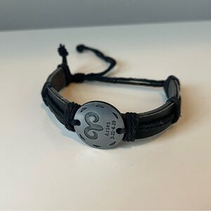 Silver and black aries bracelet